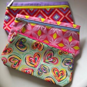 Clinique Multicolor Set of 3 Cosmetic Pouches - Pink, Purple, Yellow, Green